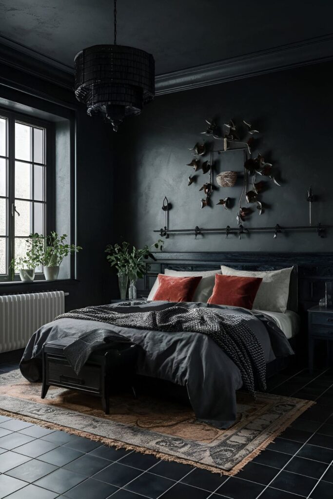 A gothic bedroom with dark tiles used for flooring and wall accents, including black, dark grey, and deep red tiles for a sleek, modern touch