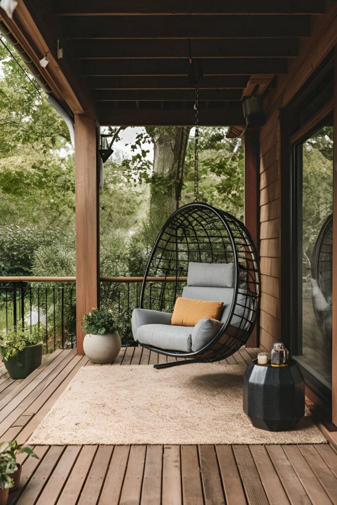 A patio featuring compact swing chairs with weighted bases or secure mounts, providing a cozy seating option that remains stable in windy conditions