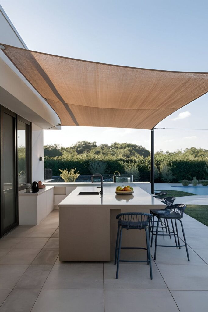 Modern shade sail providing protection without blocking view of surroundings