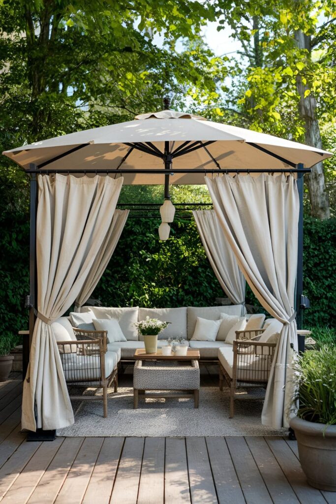 Patio umbrella with curtain panels providing shade and creating an intimate space