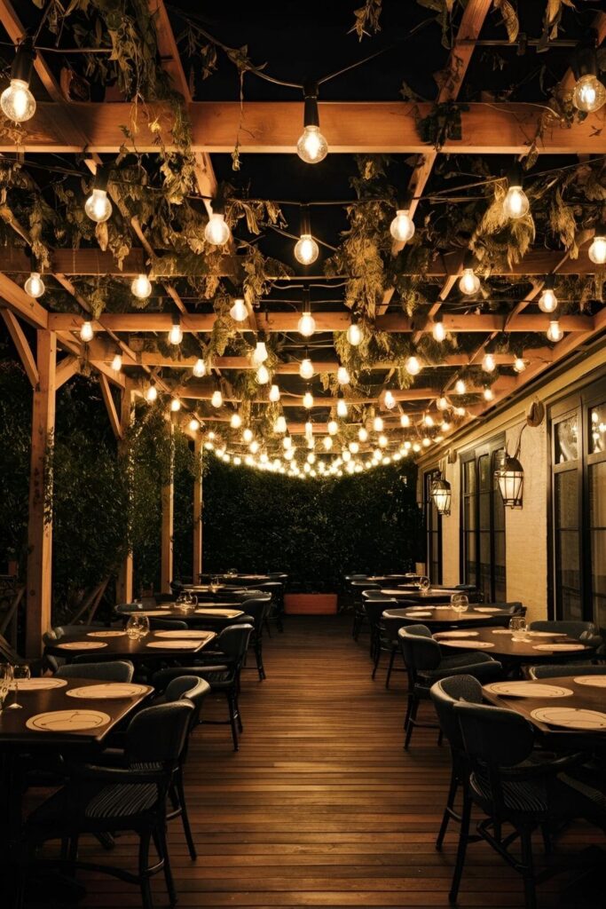 Patio with bistro lighting, globe lights overhead creating a romantic atmosphere