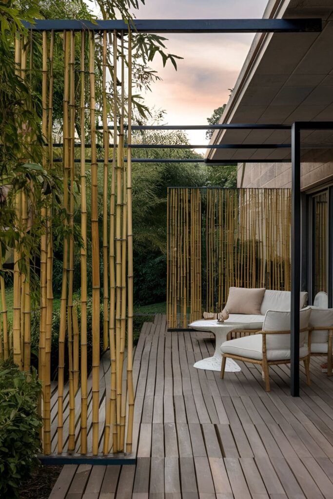 Stylish decorative screens made of bamboo, providing privacy and a touch of nature on a patio, with comfortable outdoor seating nearby