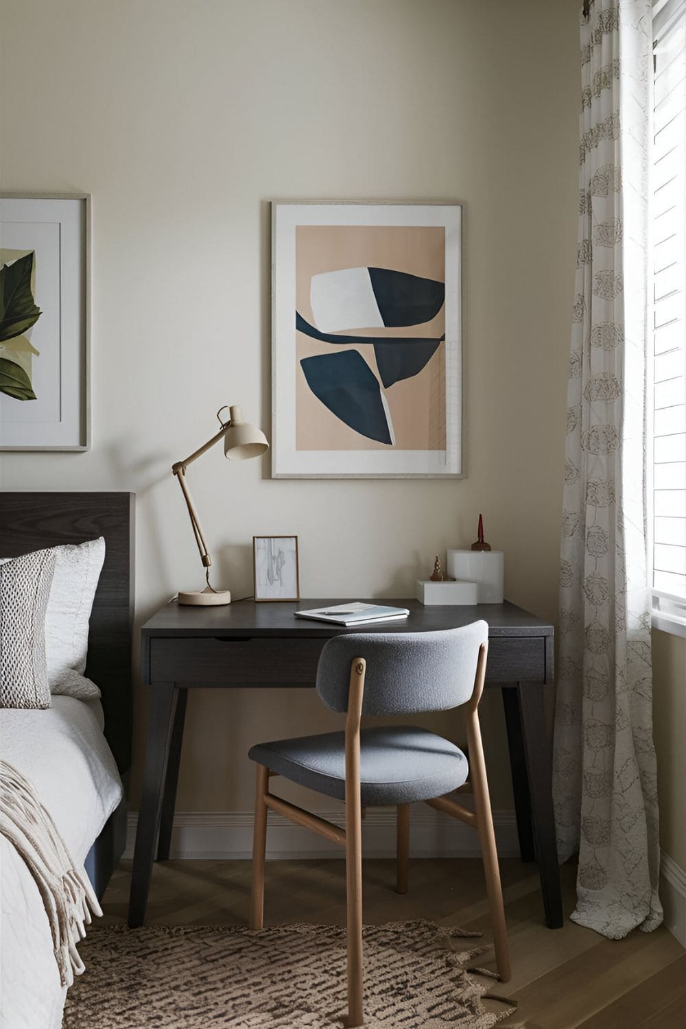 Functional workspace in a bedroom with a dark wood desk comfortable chair minimalistic accessories and neat setup