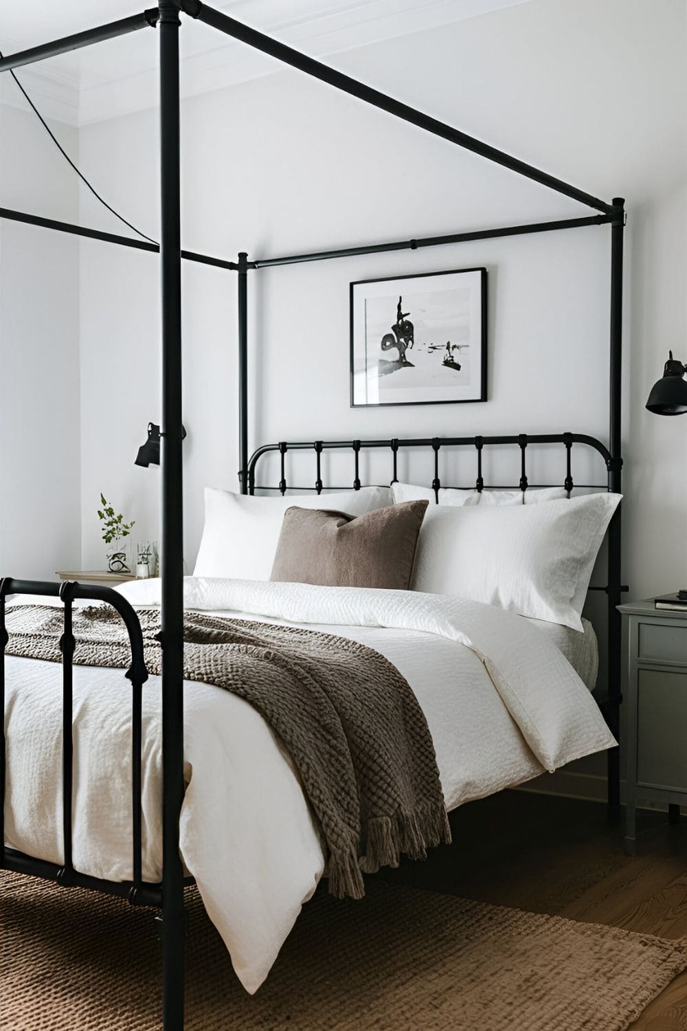 bedroom bed with black frame and white bedding