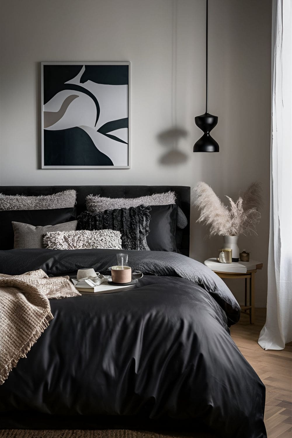 black bedroom with black bed