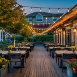 Outdoor patio ofa restaurant with seasonal decor under the night sky looking it's best