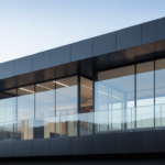 a sleek, modern touch, pair a matte black exterior with large windows or glass doors.