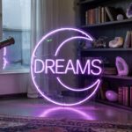 A photograph of a modern corner illuminated by a soft ethereal purple light centered around vibrant neon sign shaped like a crescent-moon