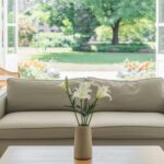 A photograph of a bright, airy open-concept living room designed for effortless flow.